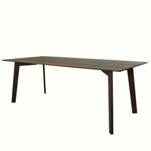 Wooden dining table in a minimalistic white room, Greimdesign