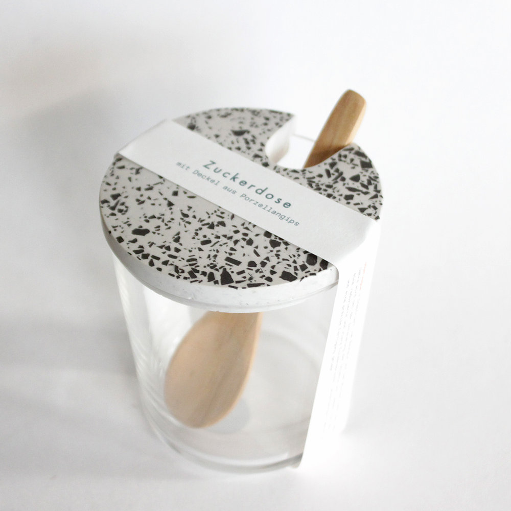 Zuckerdose-Set mit glaskörperlichem Körper und terrazzoartigem weißen Deckel, elegant gehalten